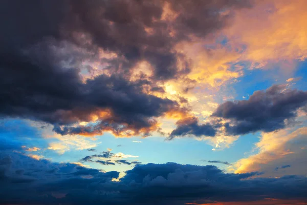 Evening clouds with colorful dusk . Colorful cloudscape