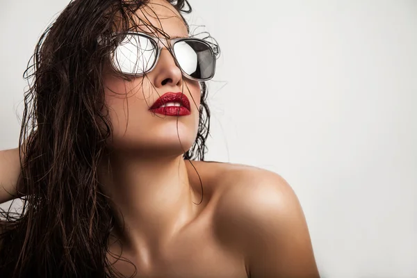 Red lips and sunglasses — Stock Photo, Image