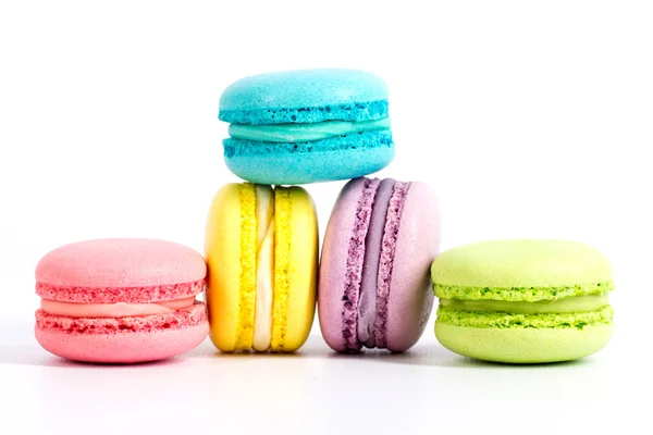 Collection of brightly colored French macarons on white background — Stock Photo, Image