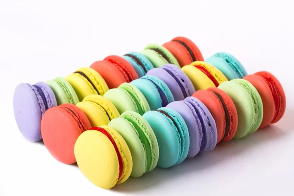 Coleção de macarons franceses coloridos estão ao lado um do outro — Fotografia de Stock
