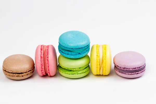 Collection of brightly colored French macarons on white backgrou — Stock Photo, Image