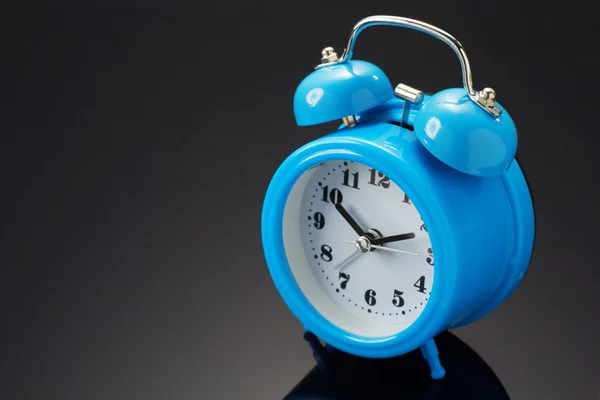 Alarm clock watch on black — Stock Photo, Image
