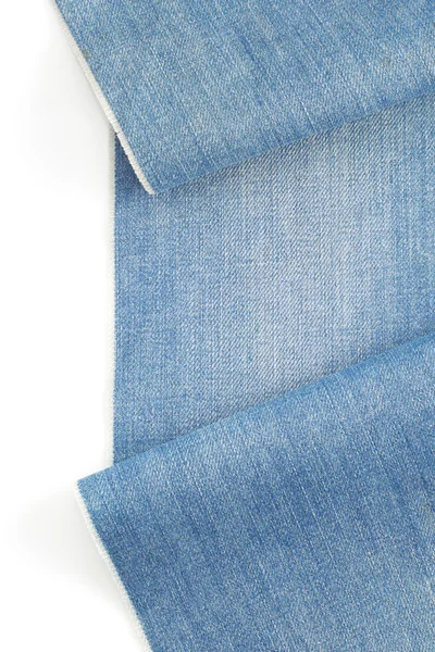 Niebieskie dżinsy tekstury na białym tle — Zdjęcie stockowe