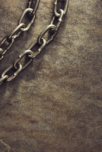 Metal chain at stone — Stock Photo, Image