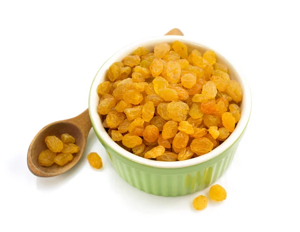 Raisins in bowl isolated on white — Stock Photo, Image
