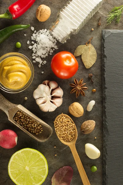 Herbs and spices at table — Stock Photo, Image