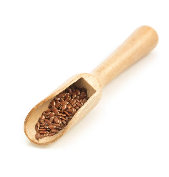 Flax seeds in scoop on white — Stock Photo, Image
