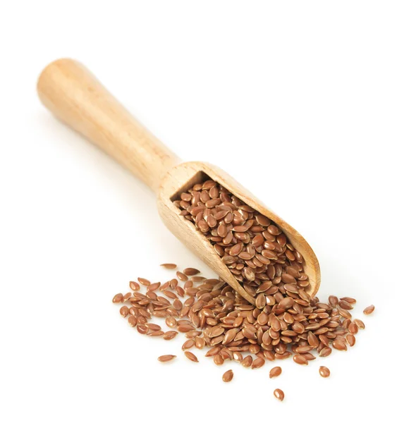 Flax seeds in scoop on white — Stock Photo, Image