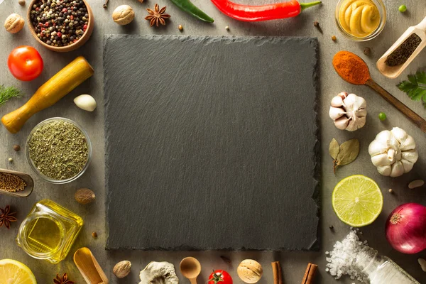 Herbs and spices at table background — Stock Photo, Image