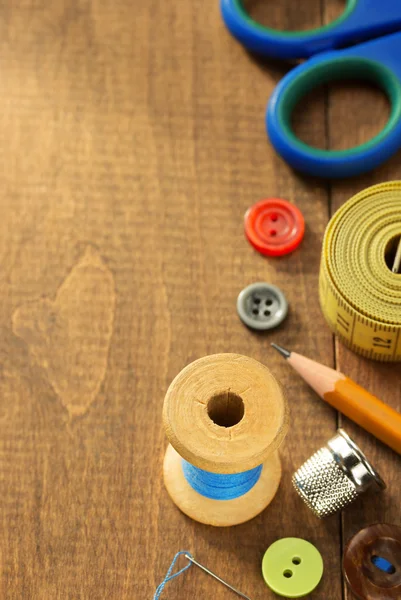 Sewing tools and accessories on table — Stock Photo, Image