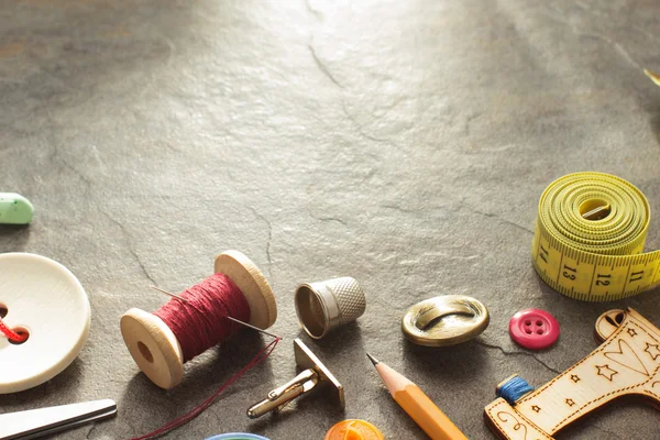 Sewing tools and accessories on table — Stock Photo, Image