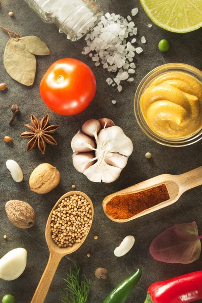 Herbs and spices at table — Stock Photo, Image