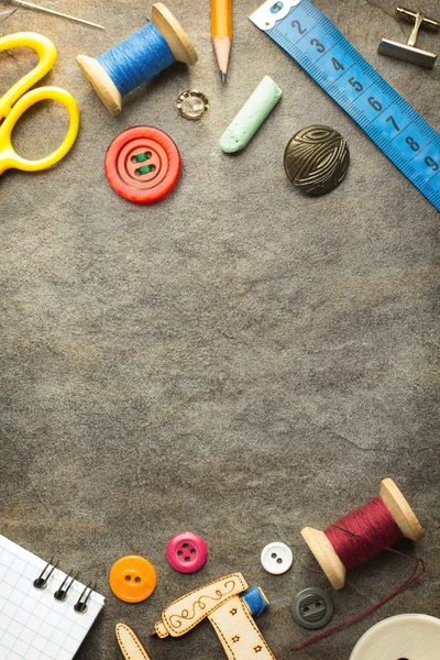 sewing tools and accessories on table