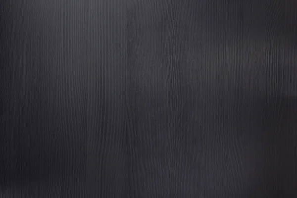 Zwarte houten oppervlak achtergrond — Stockfoto