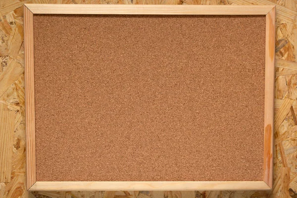 cork board at OSB wooden background, wood texture surface
