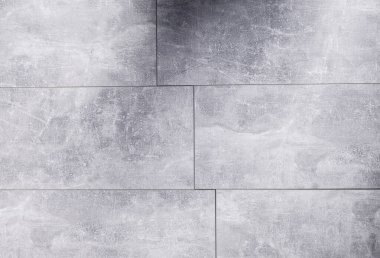 Taş ya da mermer zemin döşemesi ya da duvar dokusu. Gri kaplama arkaplanı kopyalama alanı ile