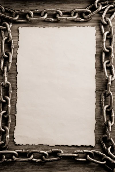 Metal chain and old paper — Stock Photo, Image