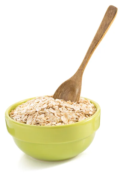 Bowl of oat flake on white — Stock Photo, Image