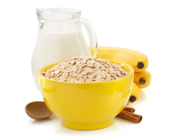 Bowl of oat flake on white — Stock Photo, Image