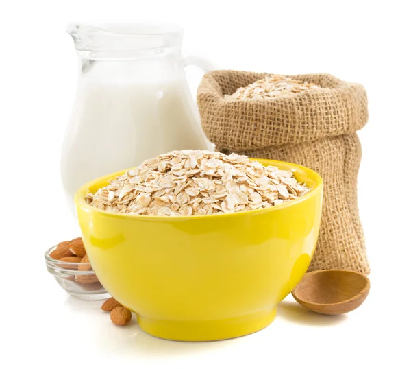 Bowl of oat flake on white — Stock Photo, Image