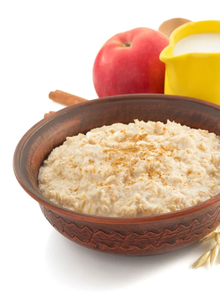 Bowl of oatmeal  on white — Stock Photo, Image