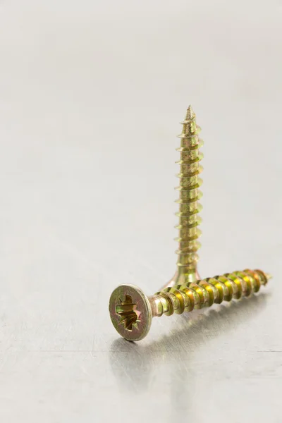 Screws tool at metal background — Stock Photo, Image