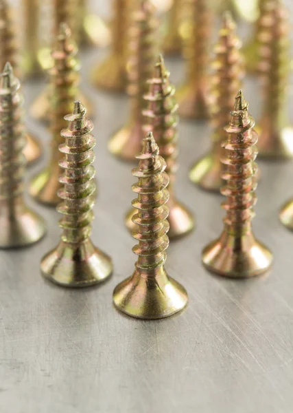 Screws tool at metal background — Stock Photo, Image