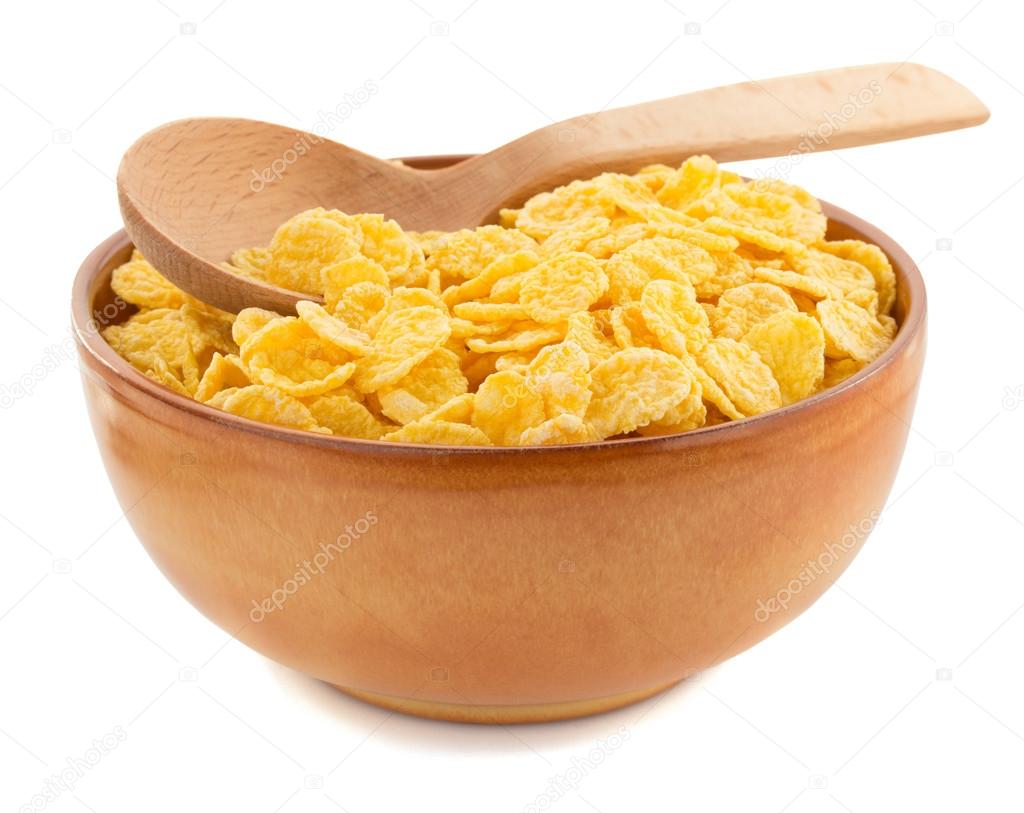 corn flakes in bowl on white 