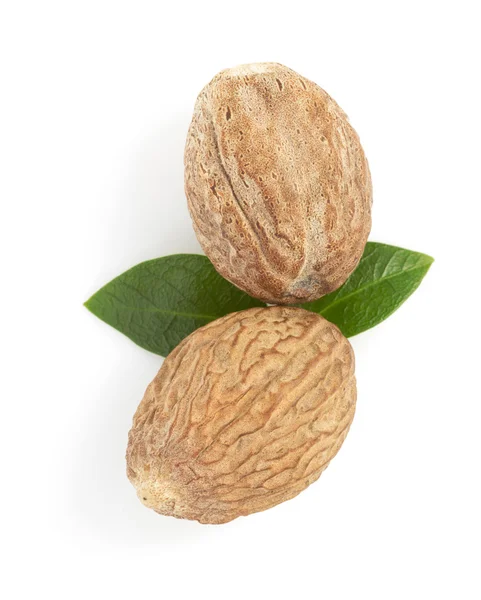 Nutmeg on white — Stock Photo, Image