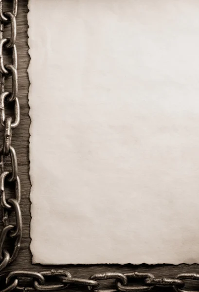 Metal chain and old paper — Stock Photo, Image