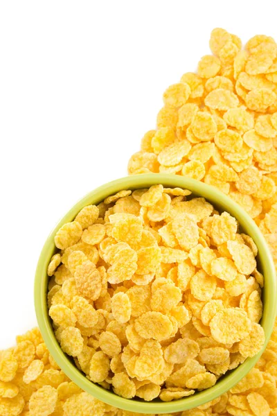 Corn flakes in bowl on white — Stock Photo, Image