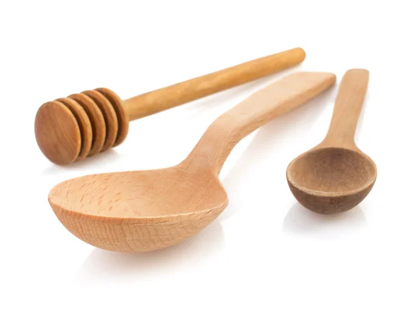 Cucchiaio di legno e bastone su bianco — Foto Stock