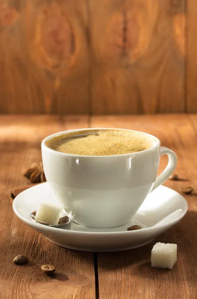 Cup of coffee on wood — Stock Photo, Image