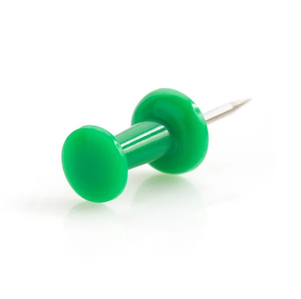 Green pushpin on white — Stock Photo, Image