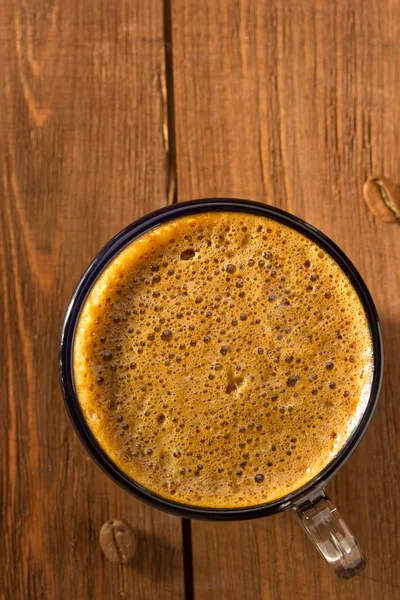 Cup of coffee on wood — Stock Photo, Image