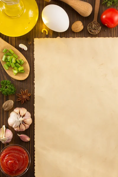 Herbs and spices on wood — Stock Photo, Image