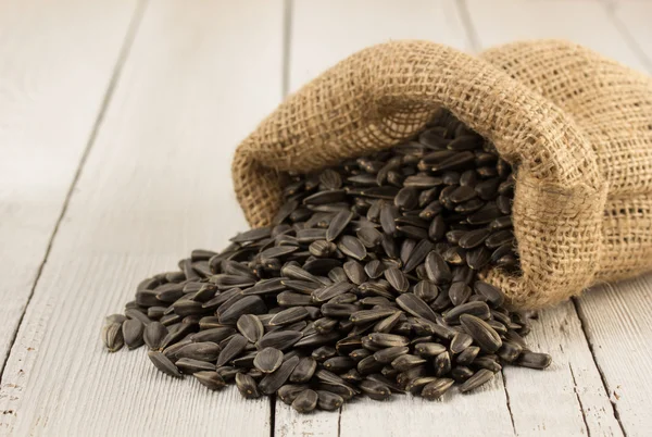 Sunflower seeds in bag — Stock Photo, Image