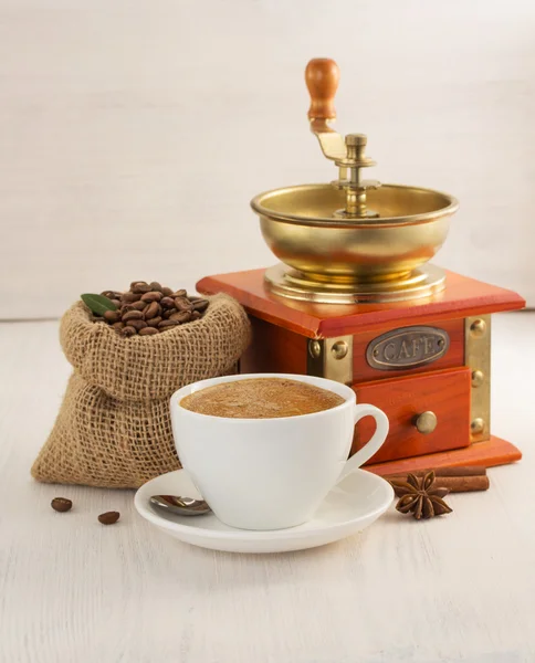 Cup of coffee with beans — Stock Photo, Image