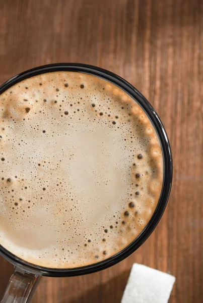 Cup of coffee on wood — Stock Photo, Image