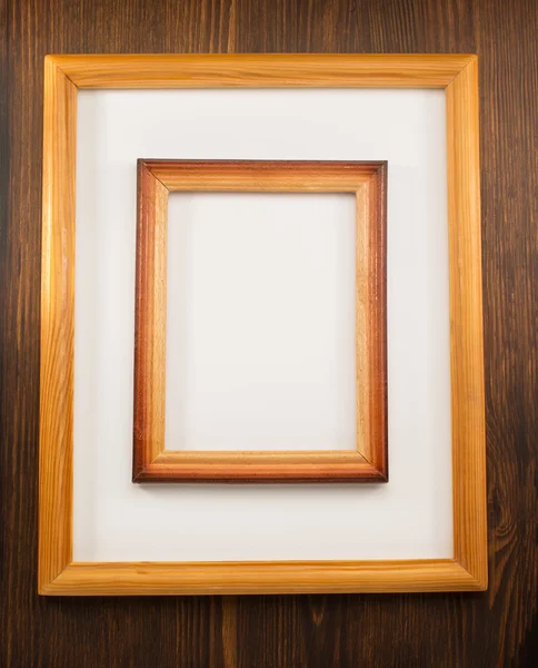 Photo picture frames on wood — Stock Photo, Image