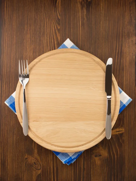 Kitchen utensils on wooden board — Stock Photo, Image