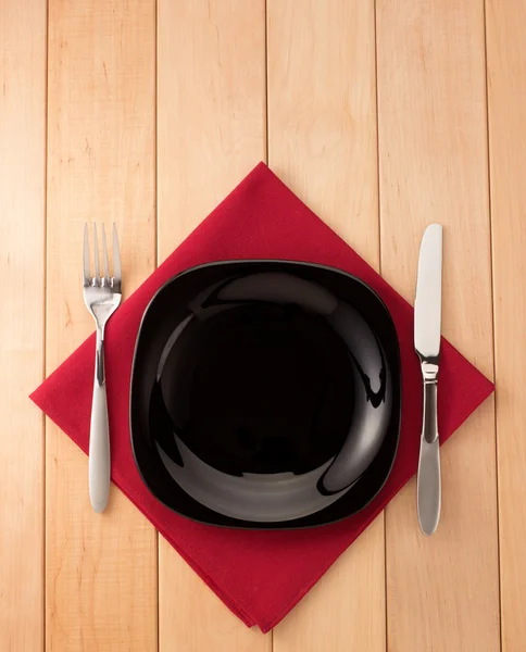 Kitchen utensils at cloth napkin — Stock Photo, Image