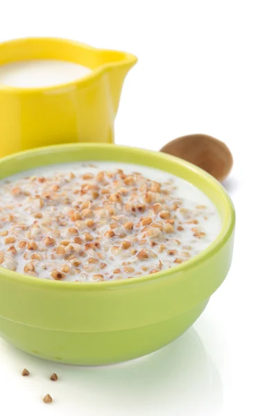 Buckwheat with milk in bowl — Stock Photo, Image