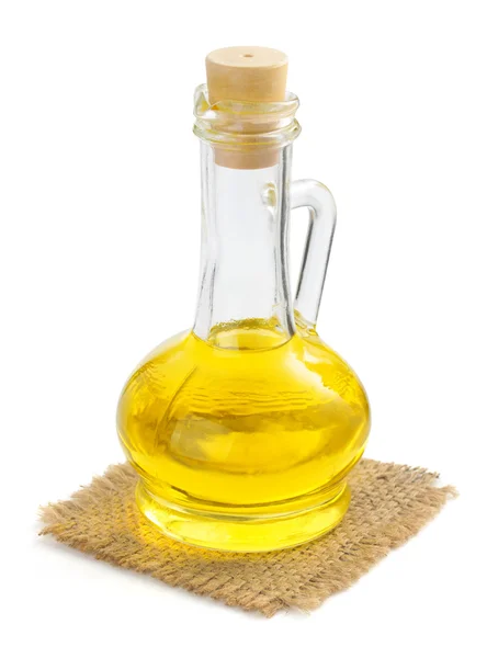 Bottle of oil on napkin — Stock Photo, Image