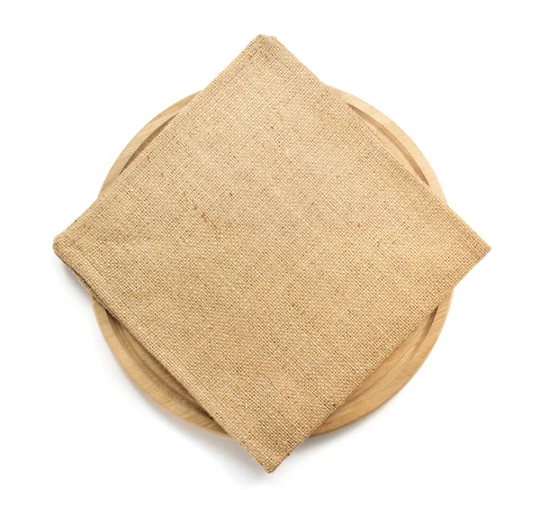 Sack burlap napkin at cutting board — Stock Photo, Image