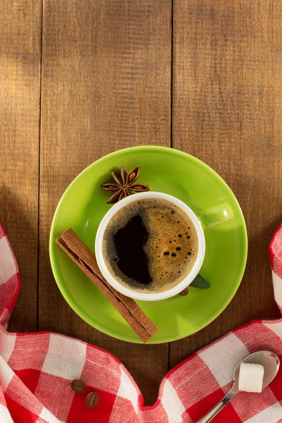 Cup of  coffee with cinnamon and anise star — Stock Photo, Image