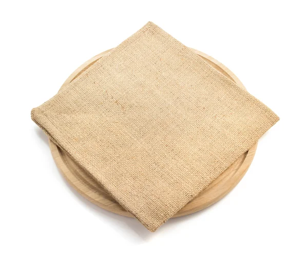 Sack burlap napkin at cutting board — Stock Photo, Image