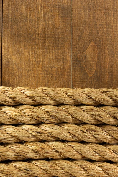 Schip touw op hout — Stockfoto