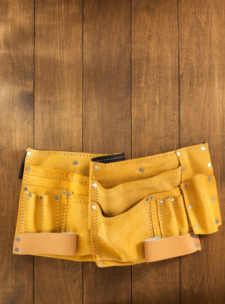 Tool belt on wood — Stock Photo, Image