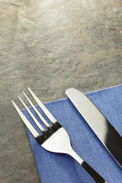 Knife and fork on napkin — Stock Photo, Image